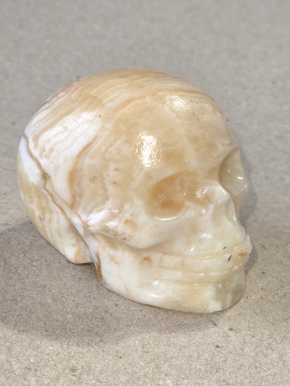 Detailed Orange/Yellow Banded Calcite Crystal Carved Skull Stone Sculpture Decor